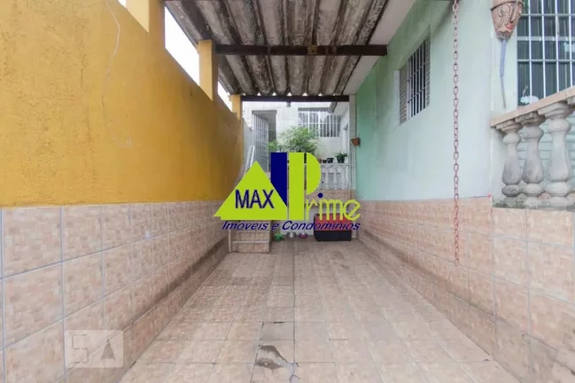 Imagem Ampla casa à venda em São Paulo-SP: 5 quartos, 1 suíte, 3 salas, 2 vagas, 210m² na Vila Buenos Aires!