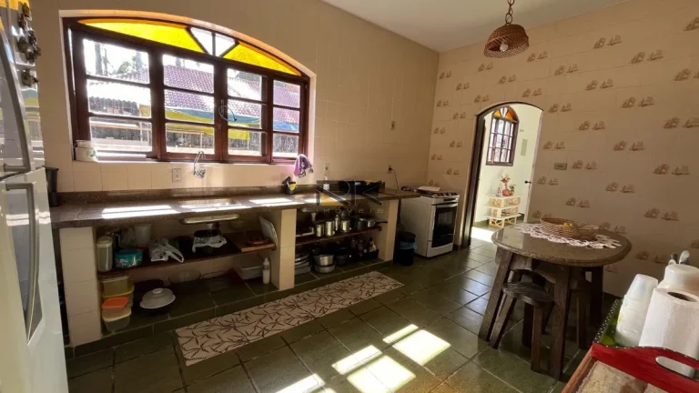 Imagem CASA EM CONDOMINIO FECHADO COM 3 DORMITÓRIOS,2 VAGAS DE GARAGEM,SALA 2 AMBIENTES