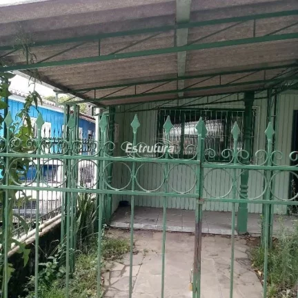 Terreno com casa próximo à Av. Walter Jobim em Santa Maria