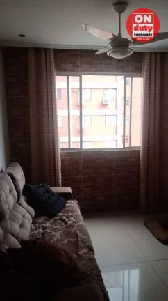 Imagem Apartamento com 2 dormitórios à venda, 64 m² por R$ 220.000,00 - Saboó - Santos/SP