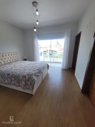 Imagem "Seu Refúgio à Beira-Mar: Sobrado de Luxo com Piscina, Automação e 5 Vagas no Cibratel 1, Itanhaém!"