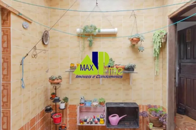 Imagem Ampla casa à venda em São Paulo-SP: 5 quartos, 1 suíte, 3 salas, 2 vagas, 210m² na Vila Buenos Aires!