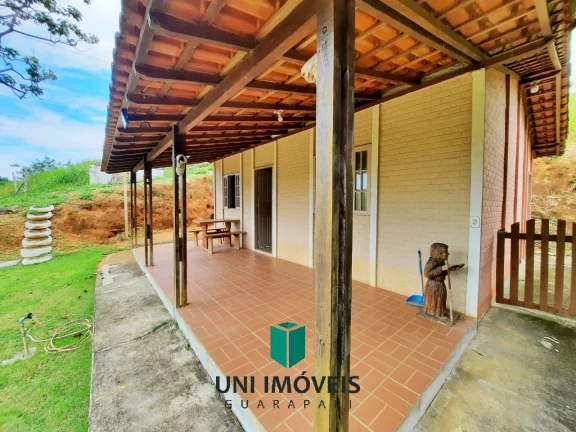Imagem Chácara com 2 casas mais casa de caseiro, área de lazer, 10.000M² a venda na zona rural de Guarapari.