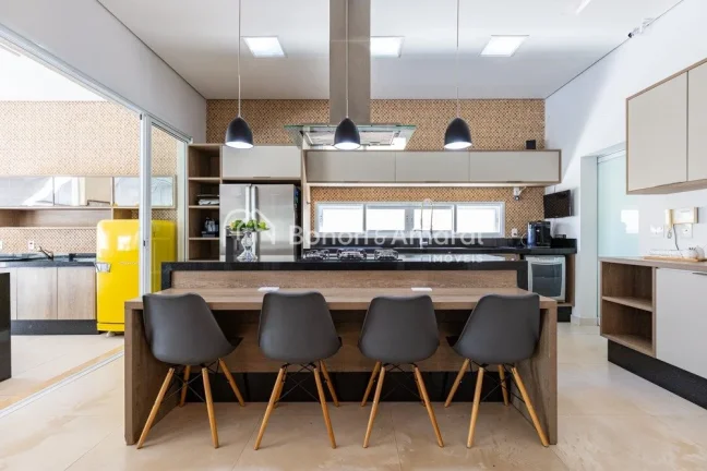 Imagem Imponente e diferenciado, este sobrado de esquina no Swiss Park encanta pelo design contemporâneo e...