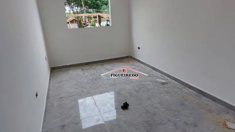 Imagem Casa com 2 dormitórios à venda, 60 m² por R$ 350.000 - Tude Bastos - Praia Grande/SP
