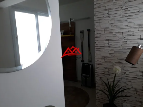 Apartamento à venda Itaguá, Ubatuba, com varanda gourmet, 3 suítes, lavabo, 2 vagas, piscina, sauna, academia