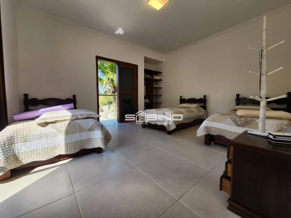 Imagem Casa à venda com 5 Dormitórios 3 suítes, 407m² de área construída - Riviera de São Lourenço - Bertioga SP.