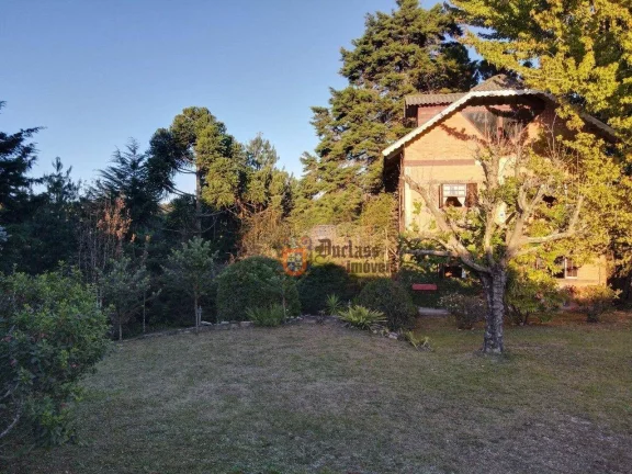 Imagem Casa com 3 dormitórios à venda, 280 m² por R$ 1.220.000 - Alto Do Capivari - Campos do Jordão/SP