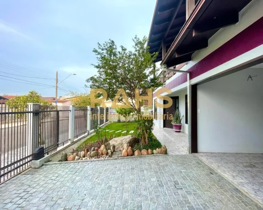 Imagem Ótimo sobrado averbado localizado no Saguaçu, com amplo espaço de fundos, com churrasqueira, pisc...