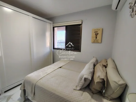 Imagem Imperdível! Apartamento de 2 quartos com suíte e 2 vagas de garagem em Pitangueiras, Guarujá-SP - 78m² de conforto e elegância!