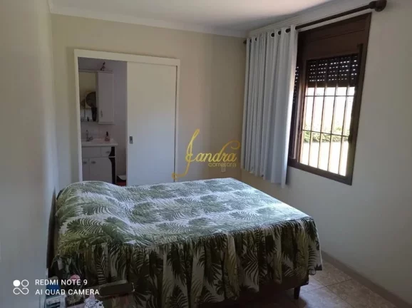 Imagem Casa composta por 03 dormitórios um sendo suíte