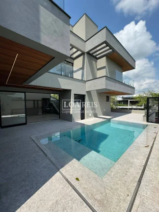 Imagem CASA 4 SUÍTES SENDO 1 SUÍTE MASTER CONDOMÍNIO ALPHAVILLE II