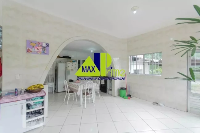 Imagem Ampla casa à venda em São Paulo-SP: 5 quartos, 1 suíte, 3 salas, 2 vagas, 210m² na Vila Buenos Aires!
