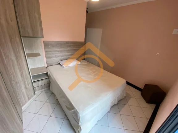 Imagem Imperdível! Apartamento à venda em Praia Grande-SP, Canto do Forte. 2 quartos, 1 suíte, 2 salas, 3 banheiros, 1 vaga. Condomínio Palm Beach, a 300m da praia.