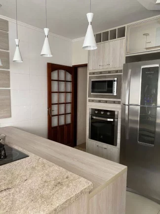 Imagem Sobrado com 3 dormitórios à venda, 159 m² por R$ 900.000 - Vila Scarpelli - Santo André/SP