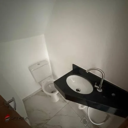Imagem Sobrado com 2 dormitórios à venda, 54 m² por R$ 345.000 - Maracanã - Praia Grande/SP
