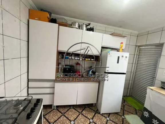 Imagem Sobrado Aconchegante à Venda em Nova Mirim, Praia Grande - 2 Quartos