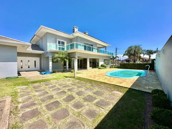 Imagem Casa 4 Dormitórios - Bairro Capão Novo