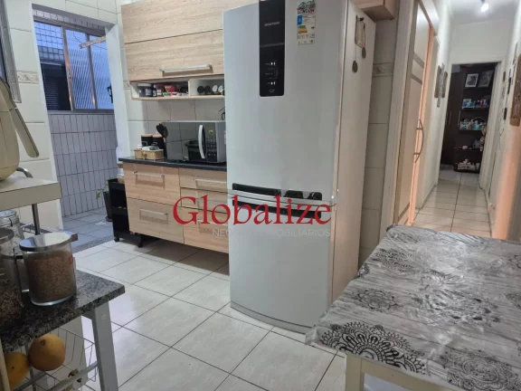 Imagem Apartamento com 2 Dormitórios e vaga demarcada à venda no Gonzaga por R$380.000,00.