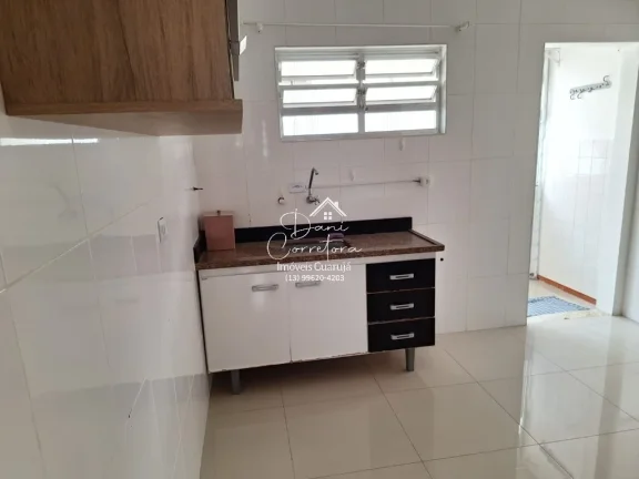 Imagem Imperdível oportunidade, apartamento de 2 quartos sem mobília na rua mais desejada do Guarujá-SP - 65m² - 1 vaga de garagem