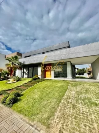 Imagem Casa térrea em condomínio fechado com 04 suites