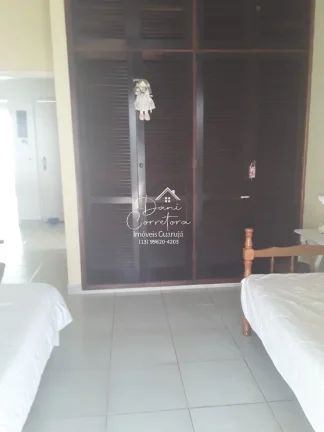 Imagem Imperdível casa à venda na Enseada, Guarujá-SP! 5 quartos, 3 suítes, 2 salas, 4 banheiros, 2 vagas de garagem. Confira!