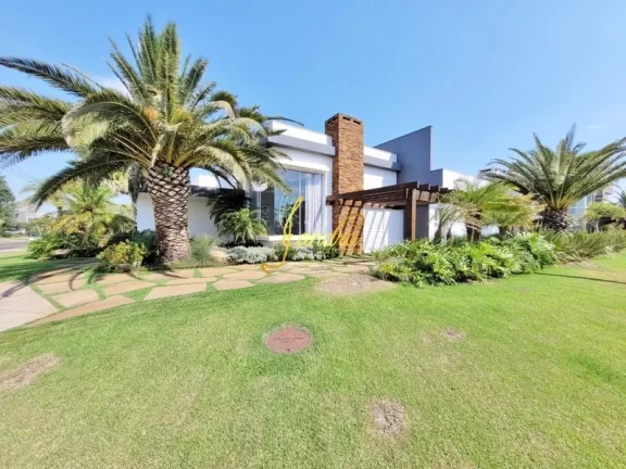 Imagem Casa térrea no Enseada com piscina aquecida e 4 suítes