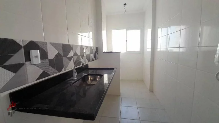 Imagem Apartamento com 2 dormitórios à venda, 56 m² por R$ 395.000,00 - Mirim - Praia Grande/SP