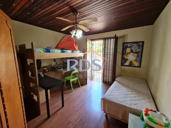 Imagem Oportunidade única, casa com 4 suítes, 5 vagas e piscina.