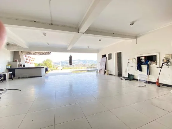 Imagem Casa em condomínio com 695 m² de área construída e 420 m² de terreno, 4 suítes, com garagem para 5 veículos,Alphaville 10-SP