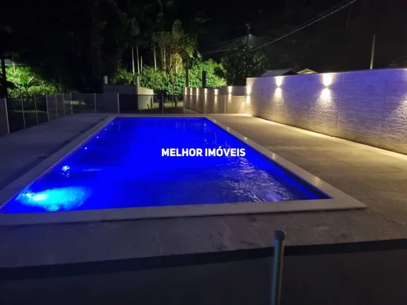 Imagem Chácara á venda com 2 casas, piscina, salão de festa localizada em Camboriú Santa Catarina