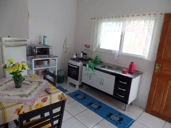 Imagem Sobrado com 2 dormitórios à venda, 77 m² por R$ 320.000,00 - Balneário Itaguaí - Mongaguá/SP