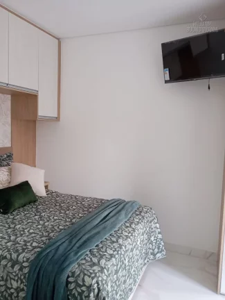 Imagem Triplex com 2 suítes à venda na Guilhermina em Praia Grande1