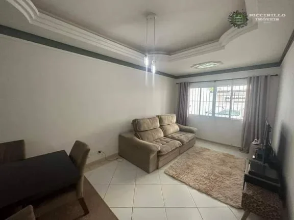 Imagem Sobrado com 3 dormitórios à venda, 125 m² por R$ 650.000 - Caiçara - Praia Grande/SP