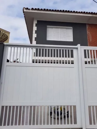 Imagem Sobrado com 2 dormitórios à venda, 79 m² por R$ 655.000,00 - Tupi - Praia Grande/SP