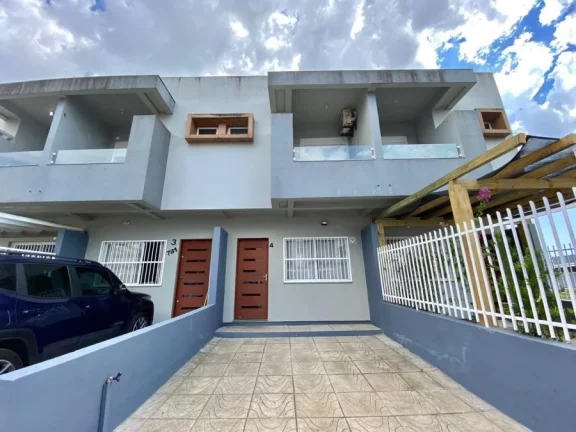 Sobrado Geminado a Venda no bairro Morada das Palmeiras - Torres, RS