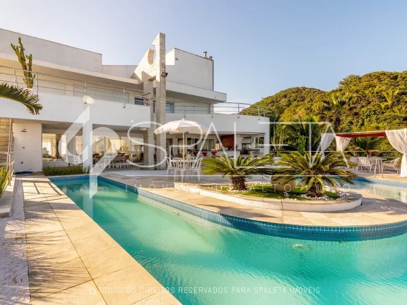 Imagem Belíssima mansão mobiliada com 10 suítes e vista para o mar à venda na Praia do Pernambuco no Guarujá