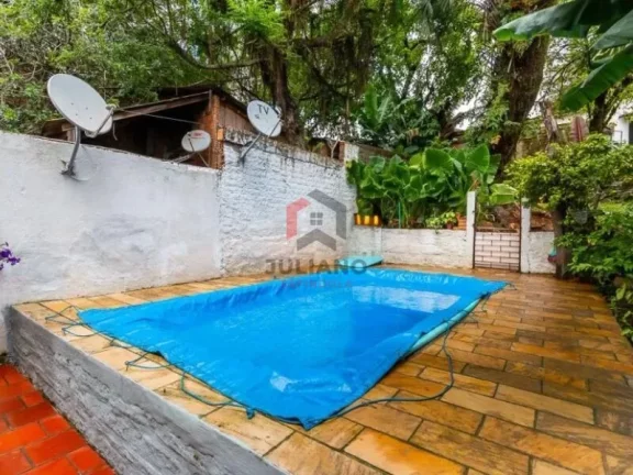 Imagem Casa com 4 Quartos à Venda, 280 m² em Vila Jardim - Porto Alegre