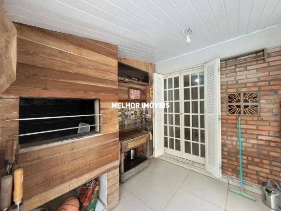 Imagem Casa com 03 dormitórios sendo 01 suíte com espaço de lazer com piscina à Venda em Sapucaia do Sul - RS