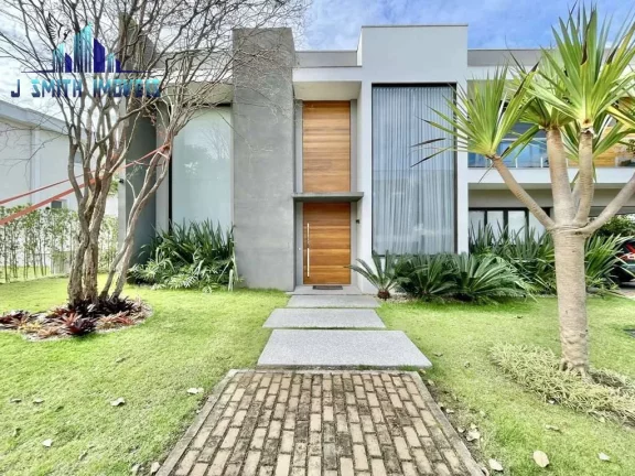 Imagem CASA À VENDA DE PORTEIRA FECHADA! Impecável, 4 suítes, elevador, piscina