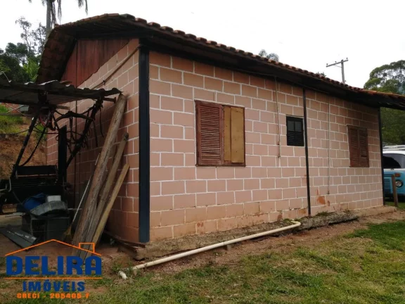 Imagem Chácara em Terra Preta em bairro tranquilo de 1.100m² à venda.