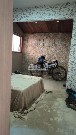 Imagem Casa à venda em Uberaba - 3 dormitórios, móveis planejados e quintal com grama!