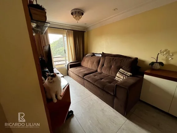 Imagem Apartamento com 2 dormitórios sendo uma suíte, 70m² de area util e uma vaga de garagem coberta.