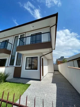 Imagem Sobrado com 2 suítes e 2 vagas de garagem – Loteamento Bela Vista | Palhoça/SC