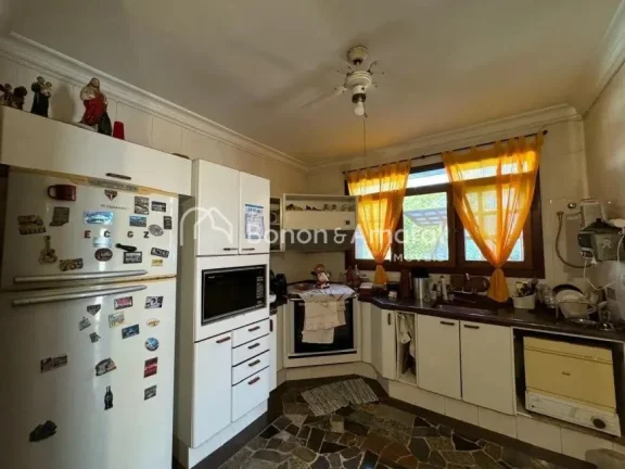 Imagem Casa charmosa e aconchegante com ambientes bem distribuídos, oferecendo hall de entrada com lavabo,...