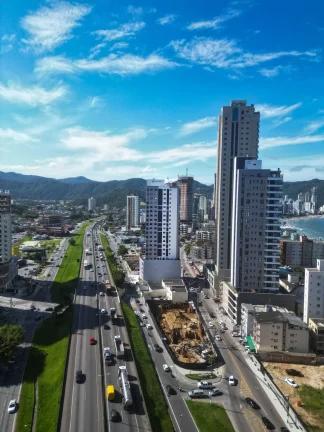 Imagem Apartamento vista mar com 3 suítes e 3 vagas de garagem no Centro de Itapema