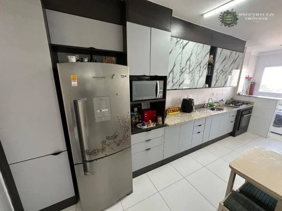 Imagem Apartamento com 2 dormitórios sendo 2 suítes à venda, 107 m² por R$ 599.000 - Aviação - Praia Grande/SP