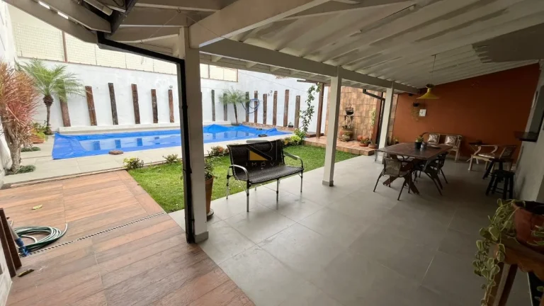 Imagem SOBRADO A VENDA NO CENTRO COM 3 DORMITÓRIOS SENDO 1 SUÍTE,SALA DE ESTAR E JANTAR,ESPAÇO GOURMET CM CHURRASQUEIRA