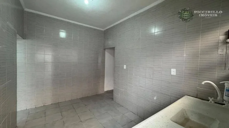 Imagem Casa com 3 dormitórios à venda, 71 m² por R$ 590.000 - Vila Guilhermina - Praia Grande/SP