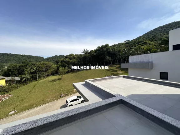 Imagem Casa de Alvenaria nova com 3 suítes localizada na Praia de Taquaras em Balneário Camboriú - SC